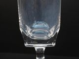 a glass that is sitting on a table