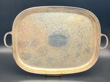 a silver tray with a handle and handles on it