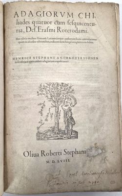 un vieux livre avec une image représentant un homme et une femme dans un arbre