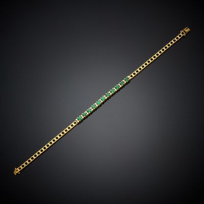 an emerald and diamond bracelet