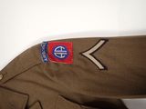 an image of a close up of a uniform on a white surface