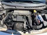 a car engine with a car battery inside of it