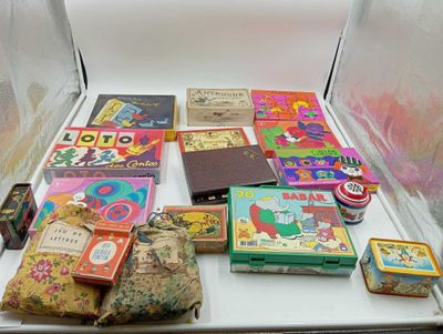 many different types of books on a white table