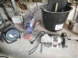 a bucket of tools on the counter next to a bucket of tools