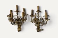 Paire d'appliques à quatre bras de lumière feuillagés et pam…