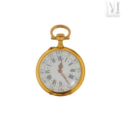 une montre de poche en or avec des chiffres romains sur le cadran
