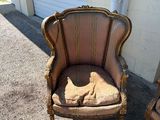 pair of antique french style chairs with upholstered cushions