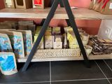 a shelf that has a lot of food on it