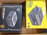two boxes of computer power supplies in a box