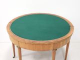 an image of a small round table with a green top