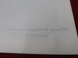 a piece of paper with writing on it on a table