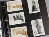an old photo album with photographs of soldiers and a fountain pen