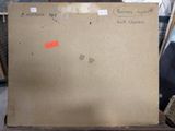 a cardboard box sitting on top of a wooden table