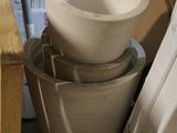 a stack of bowls sitting on top of a table