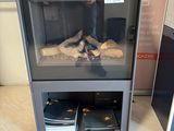 a glass display case with a bunch of food inside of it