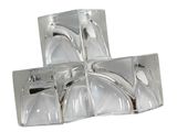 four pieces of glass sitting on top of each other