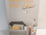 a box with a picture of a couch and a remote control