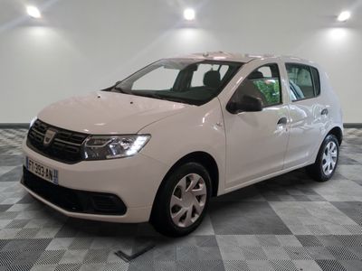 a picture of a white car parked in a garage
