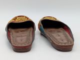 an image of a pair of women ' s shoes on a white surface