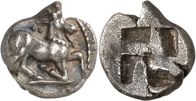 a close up of a coin with a horse on it