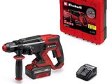 une image représentant une perceuse filaire et une batterie dans un étui