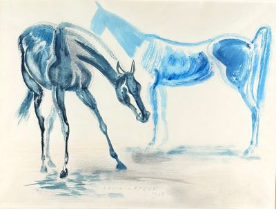 two horses that are standing next to each other