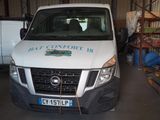 a white van that is parked in a garage