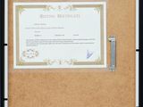 a picture of a picture of a certificate on a clipboard