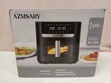 an image of a box of an air fryer sitting on a table
