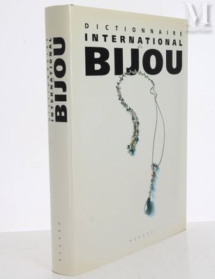 an image of a book with a picture of a necklace on it