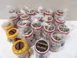 a lot of small containers of food sitting on a table