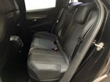 the back seats of a car are empty with no one in it