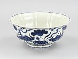 blue and white porcelain bowl with floral design on it