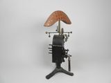 an old fashioned wind vane with a bird on top
