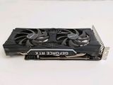 a close up of a video card on a white surface