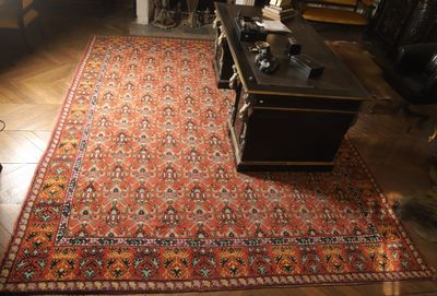 a rug on the floor in a living room