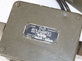 a close up of a metal device on a table