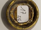 a close up of a small bowl with a tag on it