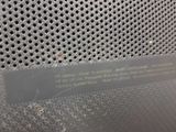 a close up of a sign on a metal surface