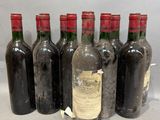 six bouteilles de vin sont alignées dans une rangée