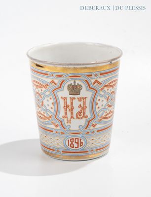 a cup that is sitting on a white table