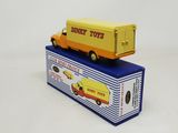 a toy truck that is sitting on top of a box
