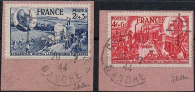 two stamps with a picture of a man and a woman on them
