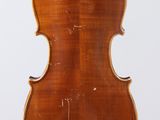 an old violin with a wooden back and a long neck