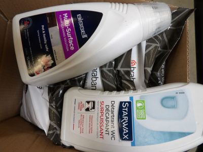 two bottles of hand sanitizer and a bottle of hand sanitizer in a box
