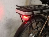a close up of a bicycle with a rear light
