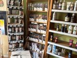 a room with a lot of shelves and boxes on the floor