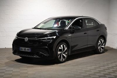the volkswagen e - pace is parked in a garage with checkered floor