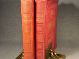 pair of antique red bookends on gold plated base