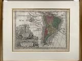 an old map of south america in a gold frame